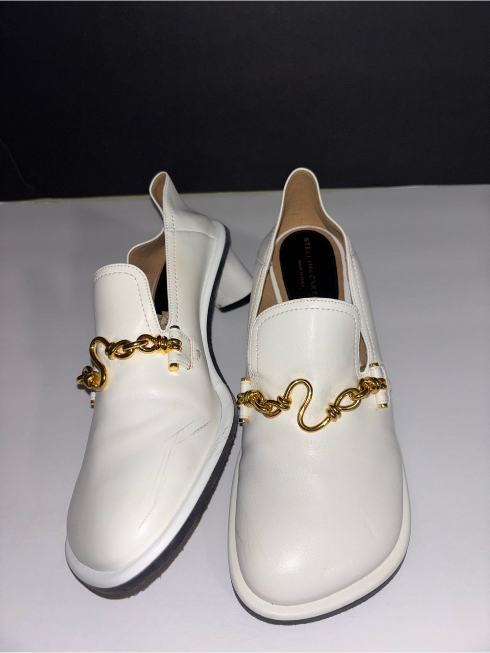 Stella McCartney White Leather Slip-On Loafers with Gold Chain Accent